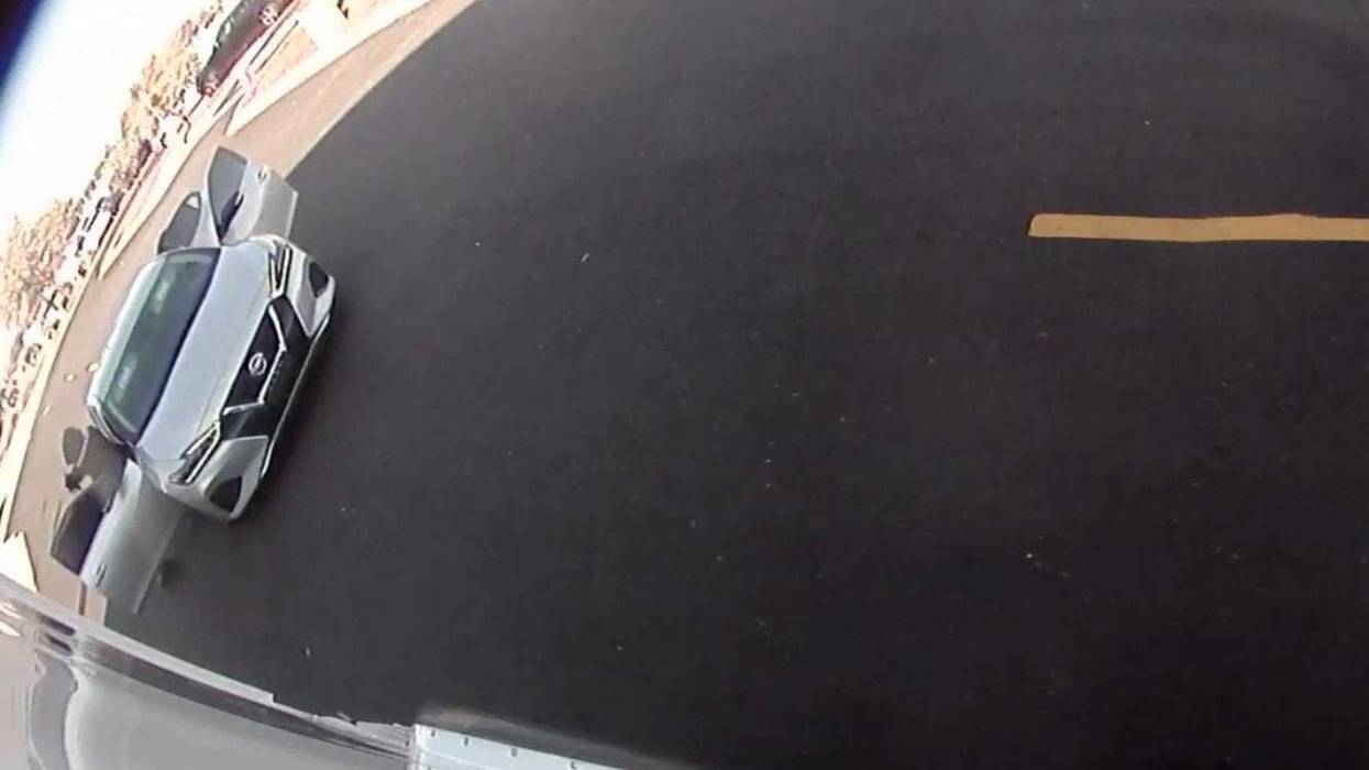 A screenshot shows an attempted armed robbery of an armored truck.