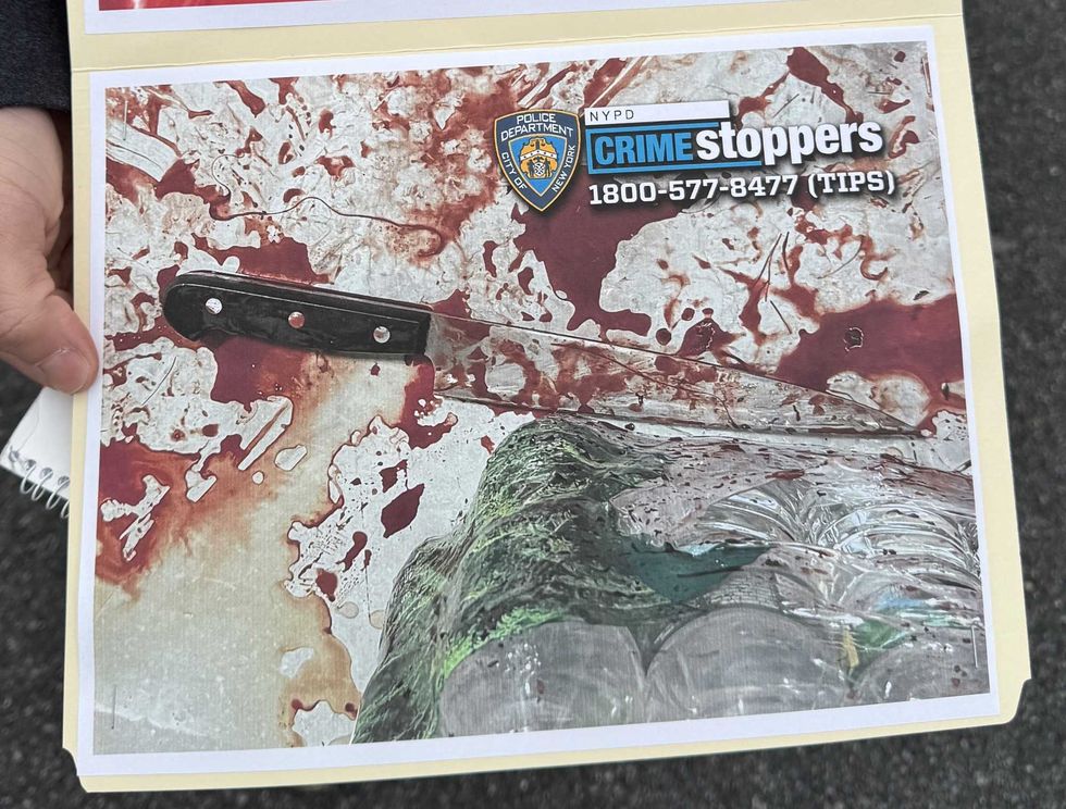 A second bloody knife was also found inside the home, police said