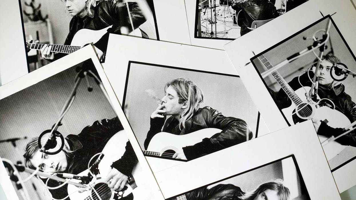 A selection of prints by Michel Linssen from the Redferns collection, depicting Kurt Cobain playing the guitar in a recording studio, pictured at the Getty Images Hulton Archive