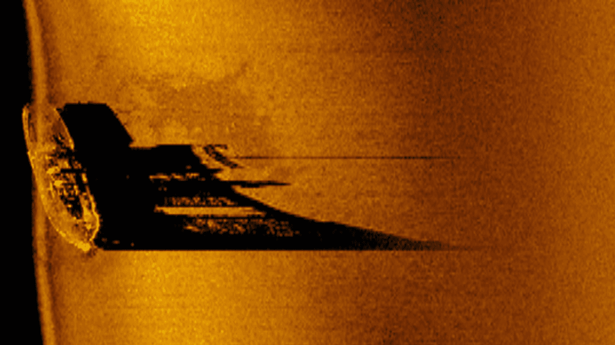 A sepia-toned sonar image of the Satellite tugboat on the bottom of Lake Superior