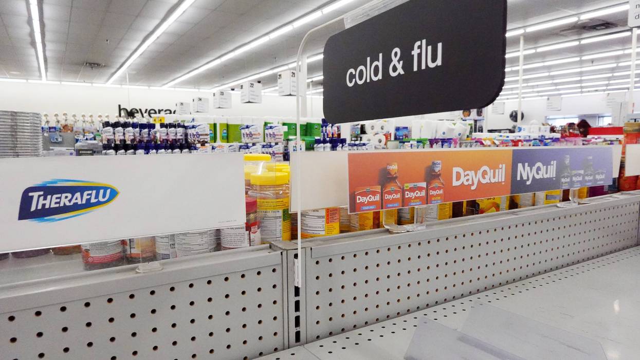 A shelf of cold and flu medicine is empty at a CVS pharmacy on Dec. 6.