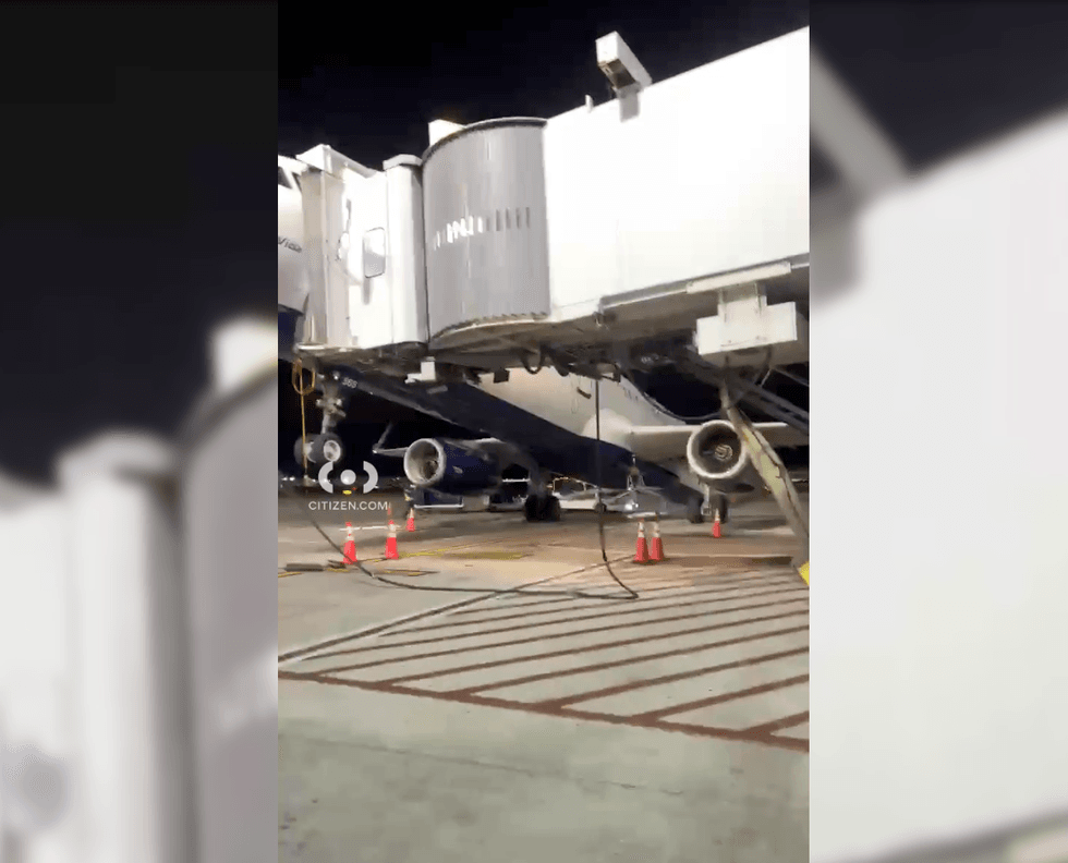 A shift in weight caused by deplaning caused the tail to dip towards the ground, officials said