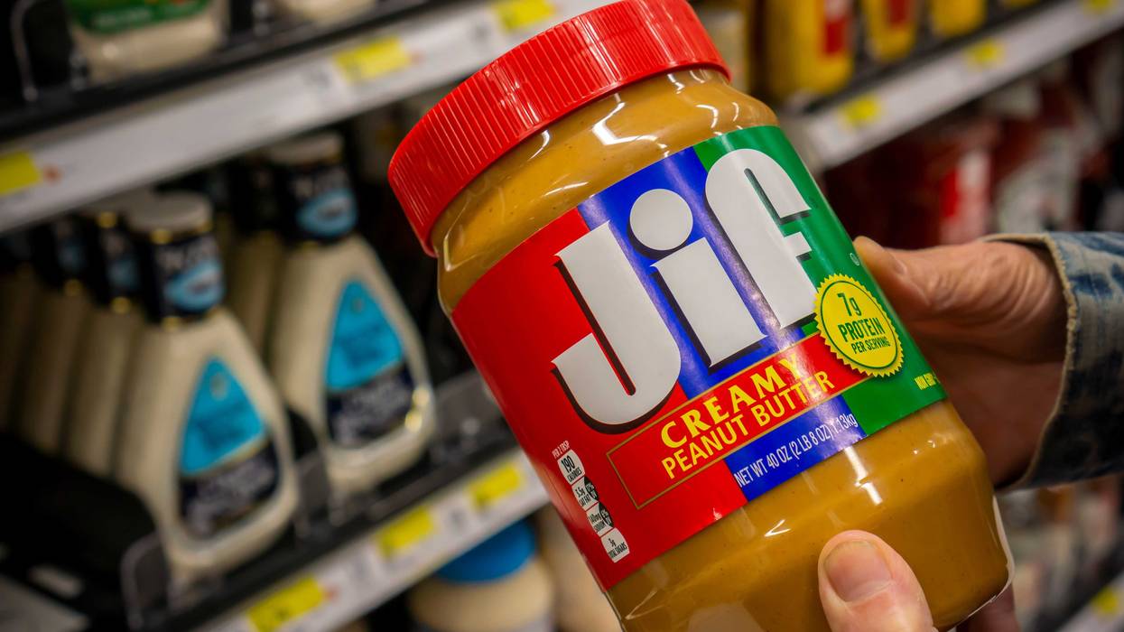 A shopper chooses a jar of the J.M. Smucker Co. Jif brand peanut butter in a supermarket in New York on Tuesday, August 27, 2019.