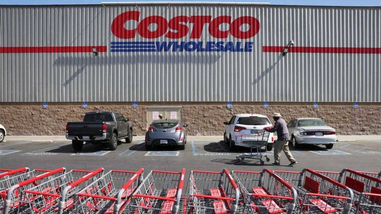 A shopper walks in front of a Costco store on February 25, 2021 in Inglewood, California.