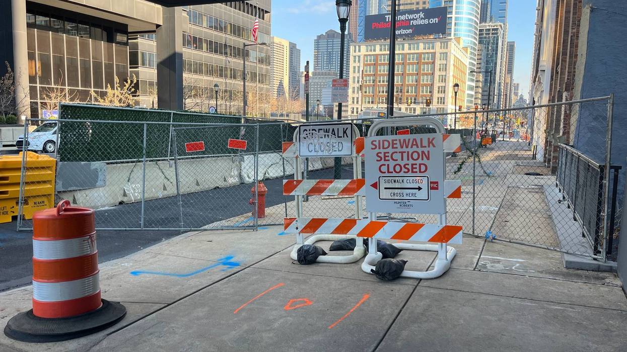 A sidewalk closure on Market Street near the corner of 23rd and Market streets in Center City.