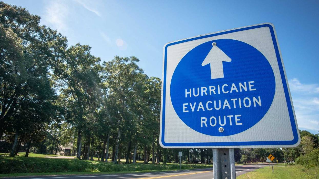 A sign directs hurricane evacuees to safety.