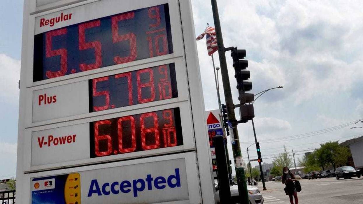 A sign displays gas prices at a gas station on May 10, 2022 in Chicago, Illinois.