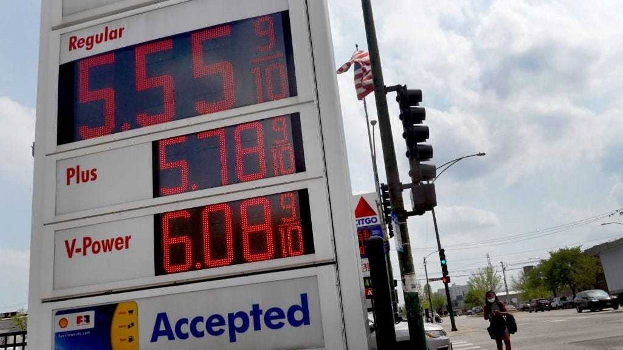 A sign displays gas prices at a gas station on May 10, 2022 in Chicago, Illinois.