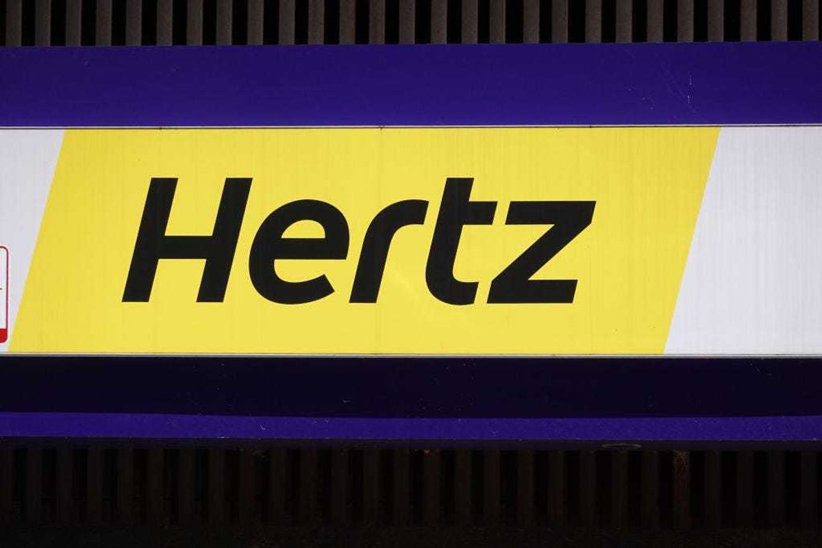 A sign hangs above a Hertz rental car office on August 04, 2020 in Chicago, Illinois.