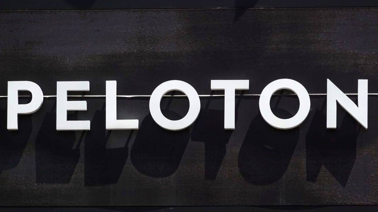 A sign hangs above a Peloton store in a shopping mall on May 11, 2023 in Oak Park, Illinois.