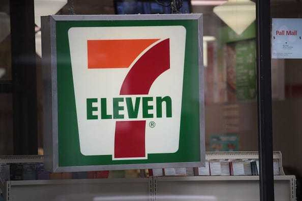 A sign hangs outside of a 7-Eleven store on January 10, 2018 in Chicago, Illinois.