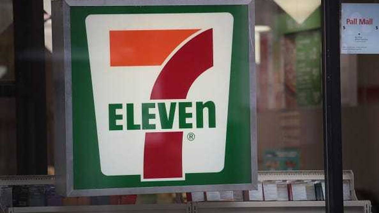 A sign hangs outside of a 7-Eleven store on January 10, 2018 in Chicago, Illinois.