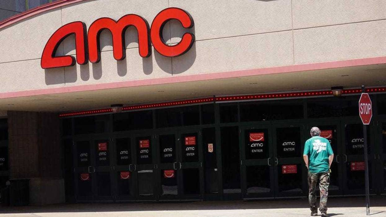 A sign hangs outside of an AMC theater on June 01, 2021 in Skokie, Illinois. Mudrick Capital has agreed to purchase 8.5 million share of the theater chain for $230.5 million. (Photo by Scott Olson/Getty Images)