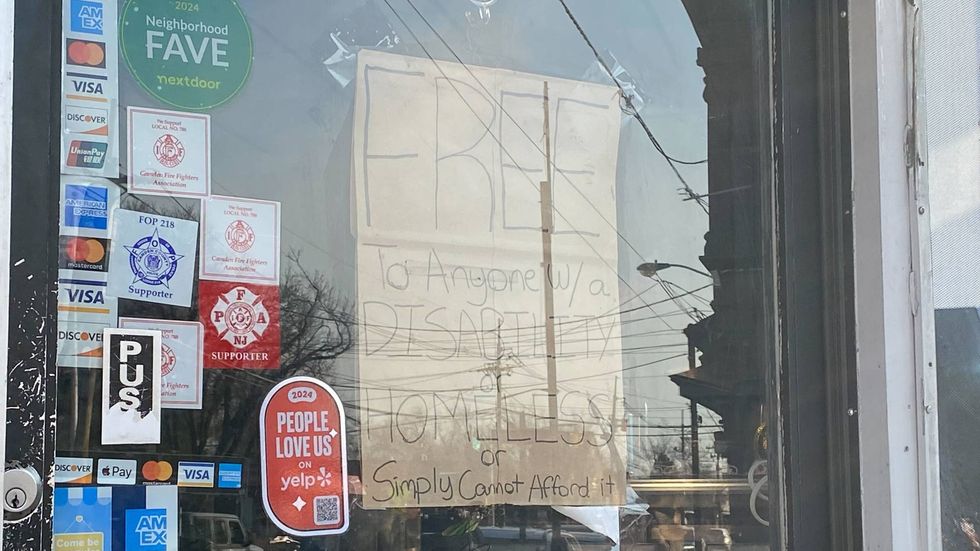 A sign in the door at Hersey Kebab reads: "Free to anyone with a disability or homeless or simply cannot afford it." Muhammed says his family is guided my their faith to give away half of what they have to those less fortunate than they are.