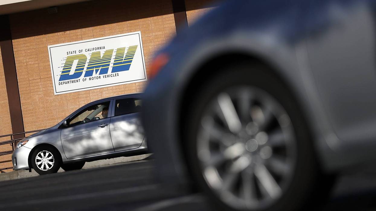 A sign is posted in front of a California Department of Motor Vehicles (DMV) office on May 9, 2017 in Corte Madera, California.