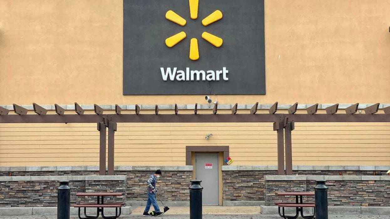 A sign is posted in front of a Walmart store on November 16, 2021 in American Canyon, California.
