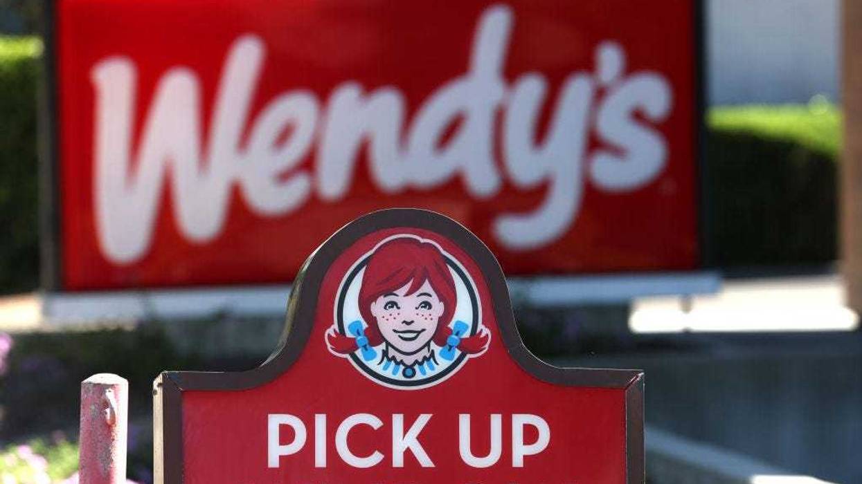 A sign is posted in front of a Wendy's restaurant on August 10, 2022 in Petaluma, California.