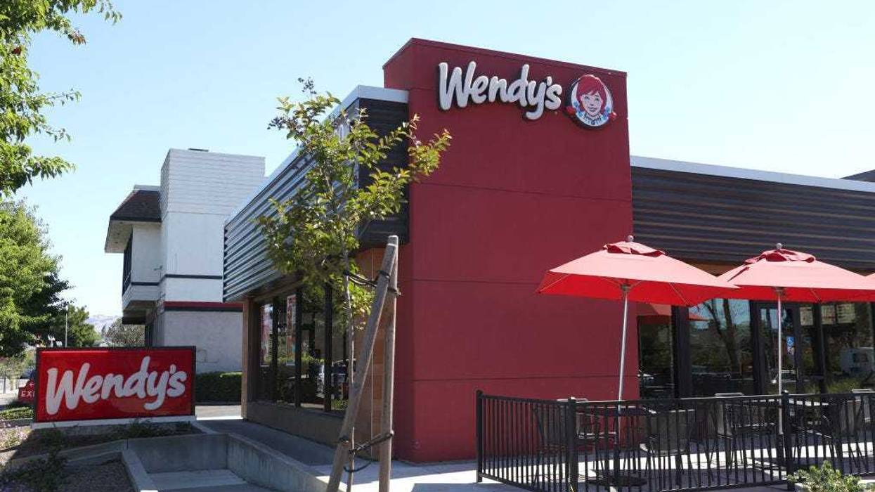 A sign is posted in front of a Wendy's restaurant on August 10, 2022 in Petaluma, California.