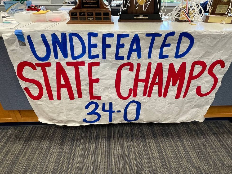 A sign marking the Plymouth Whitemarsh girls basketball state title team