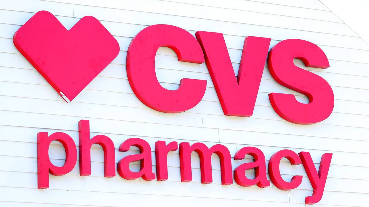 A sign on the side of the CVS Pharmacy on May 15, 2020 in Carver, Massachusetts.