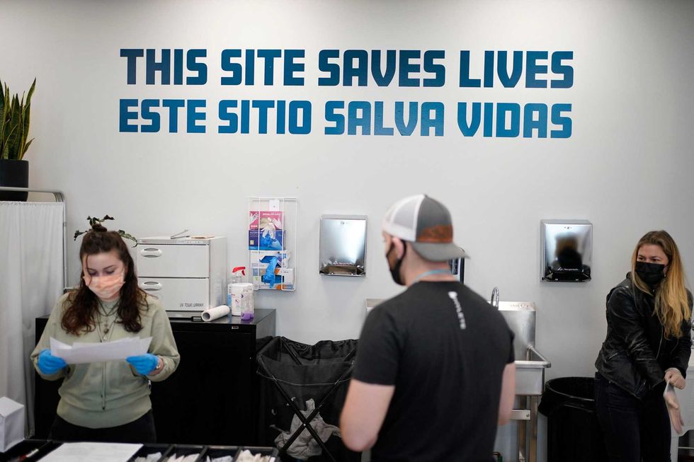 A sign on the wall reads "This site save lives" in Spanish and English at an overdose prevention center at OnPoint NYC in New York, N.Y., Friday, Feb. 18, 2022. A sign on the wall reads "This site save lives" in Spanish and English at an overdose prevention center at OnPoint NYC in New York, N.Y., Friday, Feb. 18, 2022