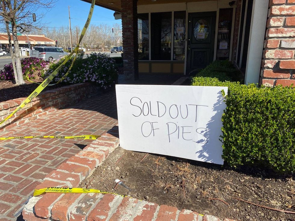 A sign outside of Marie Callender