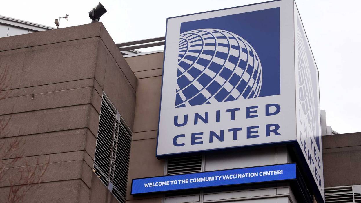 A sign outside of the United Center, home to the Chicago Bulls and Blackhawks, welcomes residents to the mass COVID-19 vaccination site set up in the stadium's parking lot on March 10, 2021 in Chicago, Illinois.