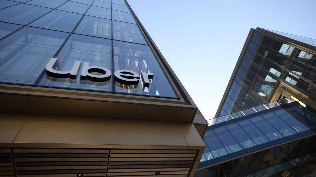 A sign posted on the exterior of Uber headquarters in San Francisco.