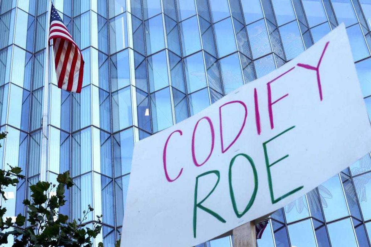 A sign reads "Codify Roe" as abortion rights supporters protest against the recent U.S. Supreme Court decision to end federal abortion rights protections outside the First Street U.S. Courthouse on June 27, 2022 in Los Angeles, California. The Supreme Court's decision in the Dobbs v Jackson Women's Health overturned the landmark 50-year-old Roe v Wade case. (Photo by Mario Tama/Getty Images)