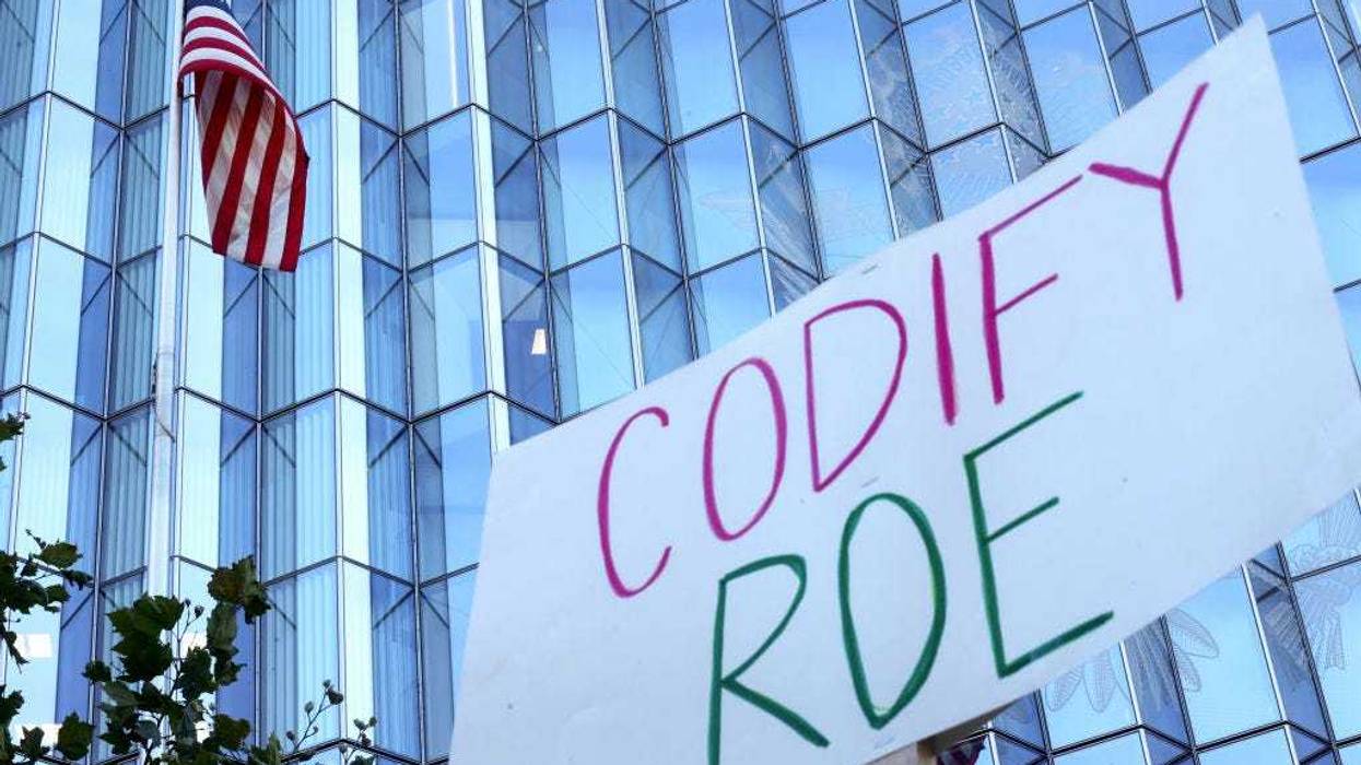 A sign reads "Codify Roe" as abortion rights supporters protest against the recent U.S. Supreme Court decision to end federal abortion rights protections outside the First Street U.S. Courthouse on June 27, 2022 in Los Angeles, California. The Supreme Court's decision in the Dobbs v Jackson Women's Health overturned the landmark 50-year-old Roe v Wade case. (Photo by Mario Tama/Getty Images)