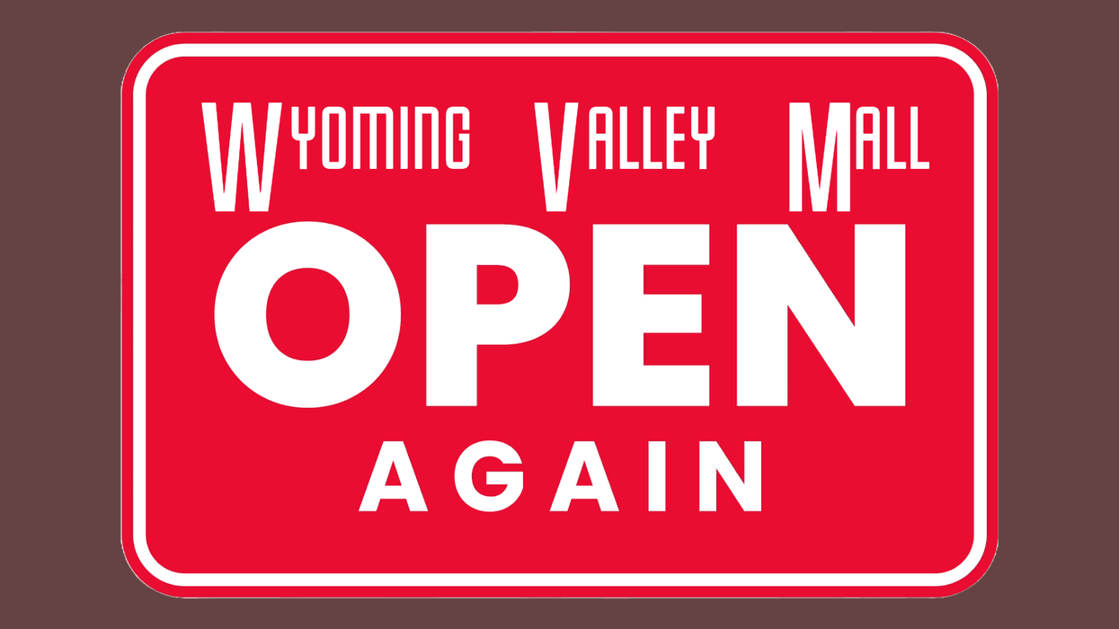A sign reads "Wyoming Valley Mall Open Again" on a red background