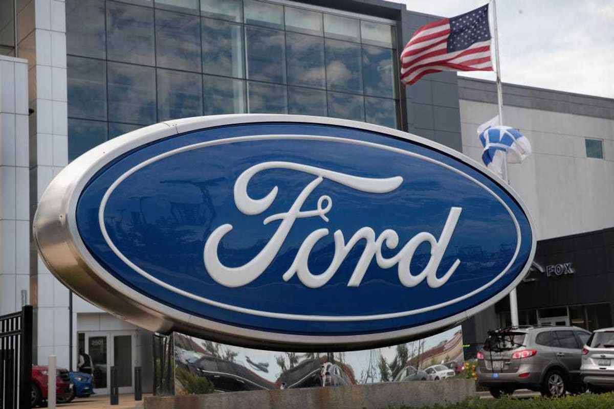 A sign sits in front of a Ford dealership on June 20, 2017 in Chicago, Illinois. Ford announced it will move production of the Focus from their Wayne, Michigan facility to China instead of Mexico as originally planned.