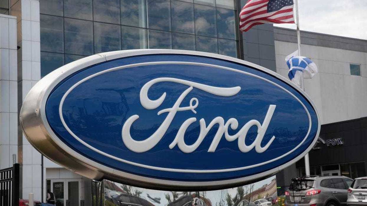A sign sits in front of a Ford dealership on June 20, 2017 in Chicago, Illinois. Ford announced it will move production of the Focus from their Wayne, Michigan facility to China instead of Mexico as originally planned.