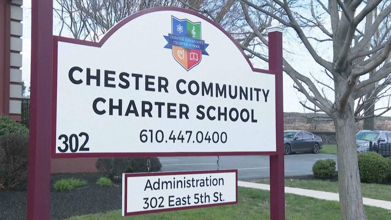 A sign stands outside the Chester Community Charter School on Monday, March 31, 2025, in Chester, Pa.