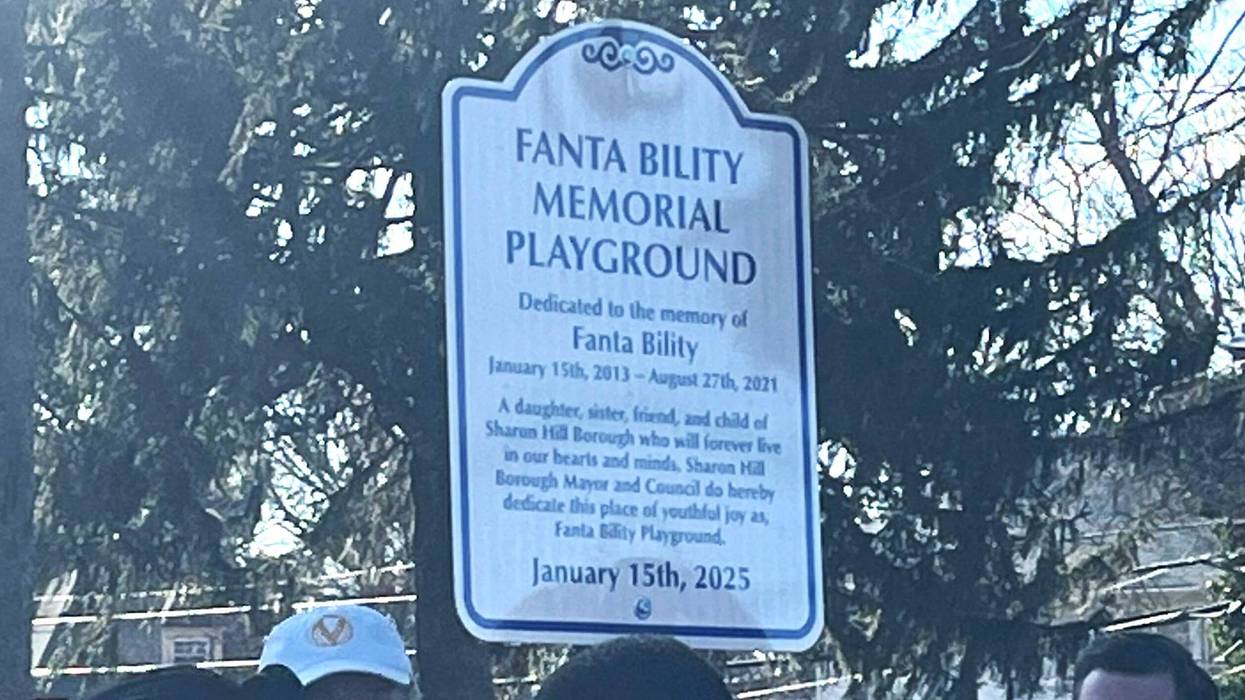 A sign that reads "Fanta Bility Memorial Playground," dedicated to her memory.