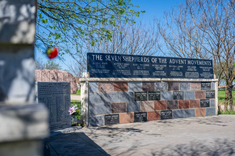A single rose is seen stationed at a memorial at the former Branch Davidian compound on March 25, 2023, in Waco, Texas.