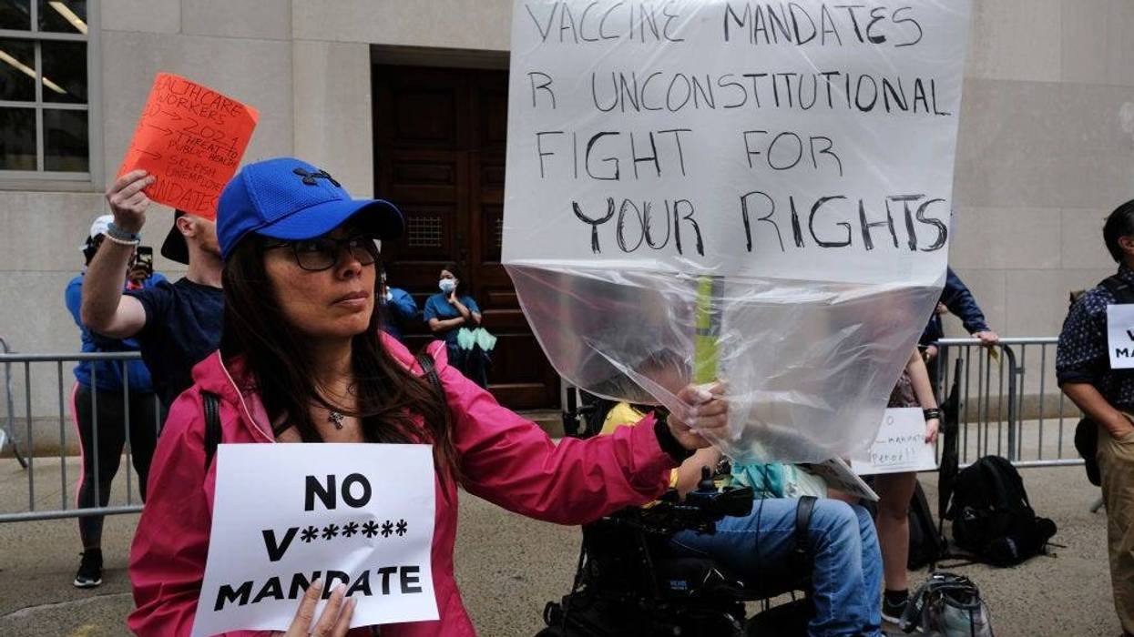 A small group of anti-vaccination protesters gather outside of New York-Presbyterian Hospital on September 01, 2021 in New York City.