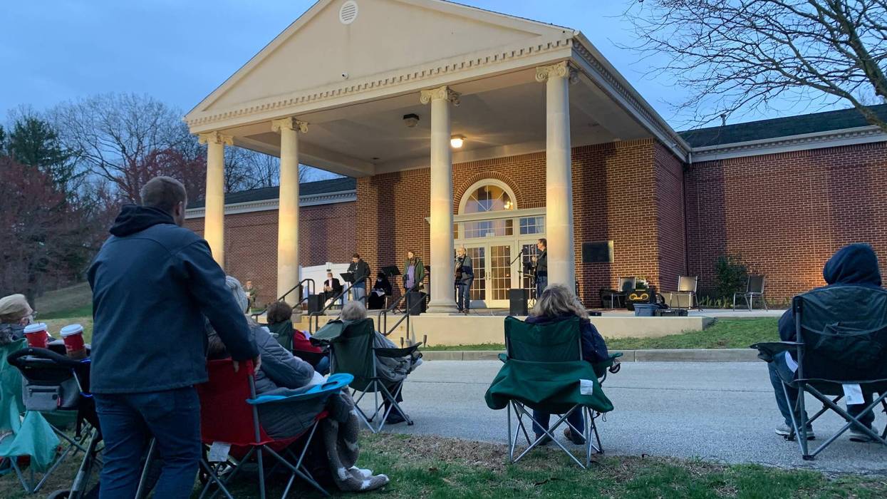 A socially distanced crowd gathers at Lakeview Memorial Park in Cinnaminson, New Jersey for a sunrise Easter service.