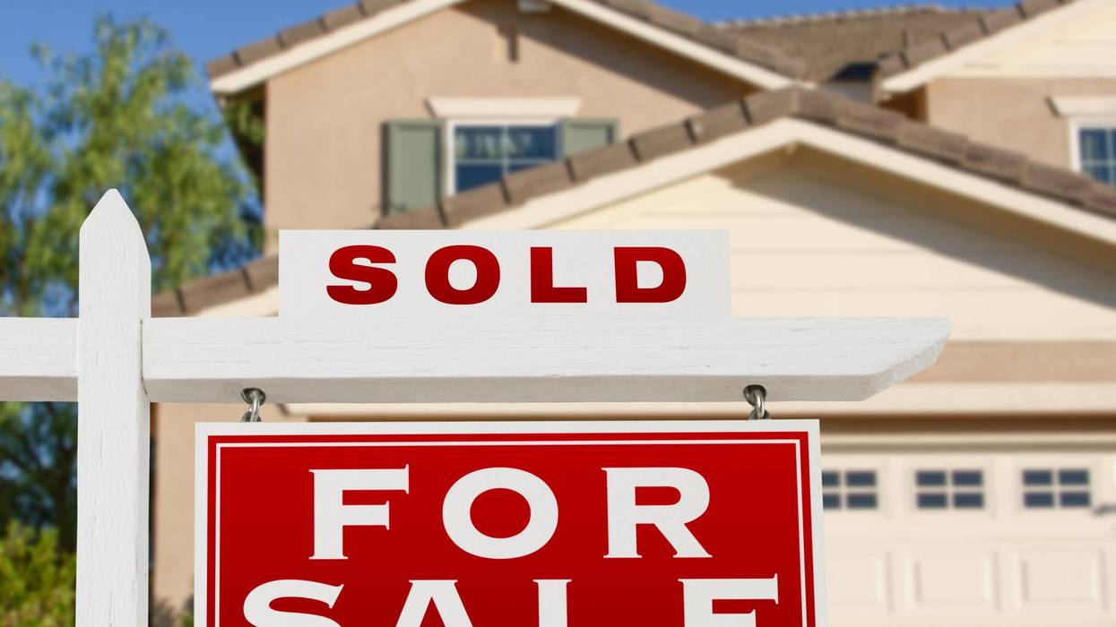 A "sold" sign, signifying that a home is off the market