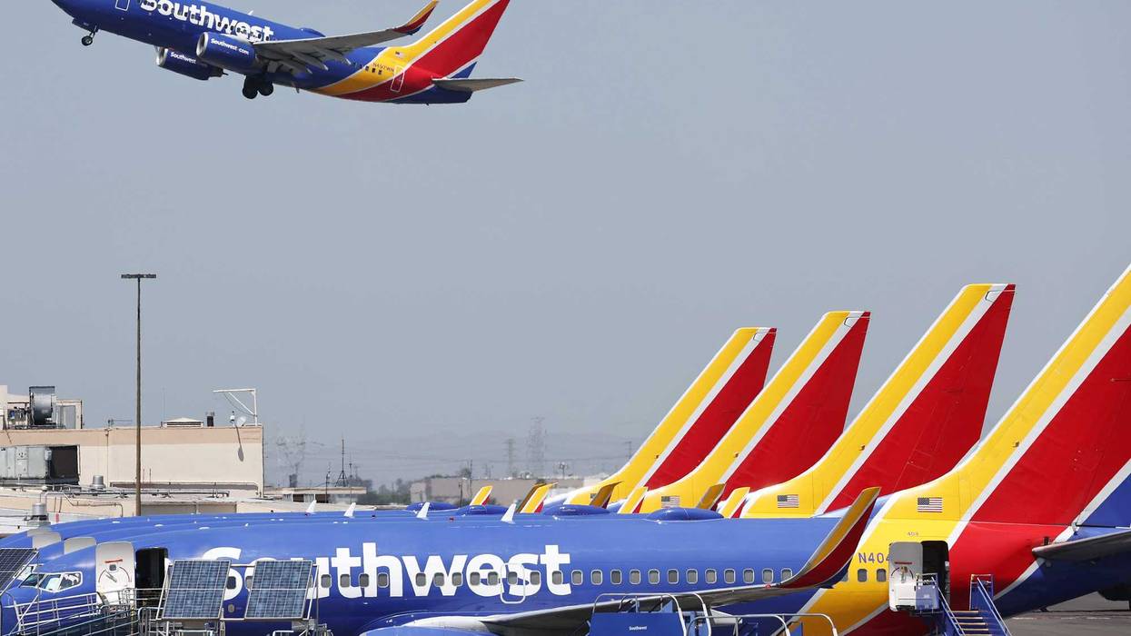 A Southwest Airlines plane takes off from Hollywood Burbank Airport as other Southwest planes are parked at their gates on July 25, 2024, in Burbank, California.