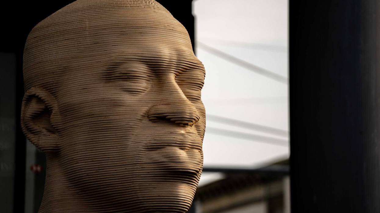 A statue of George Floyd is unveiled at Flatbush Junction on June 19, 2021, in the Brooklyn borough of New York City