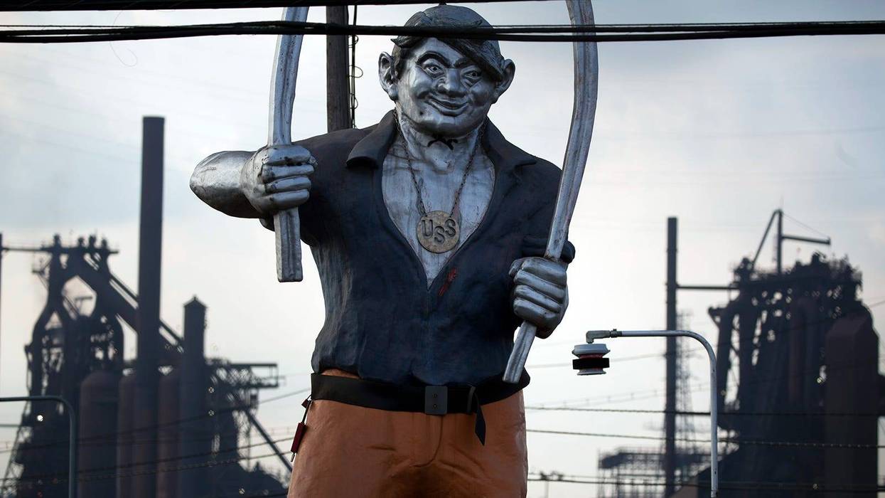 A statue of mythical folk hero Joe Magarac, a man made of steel who protected iron workers, is seen outside the United States Steel Edgar Thompson Works in Braddock, Pennsylvania.