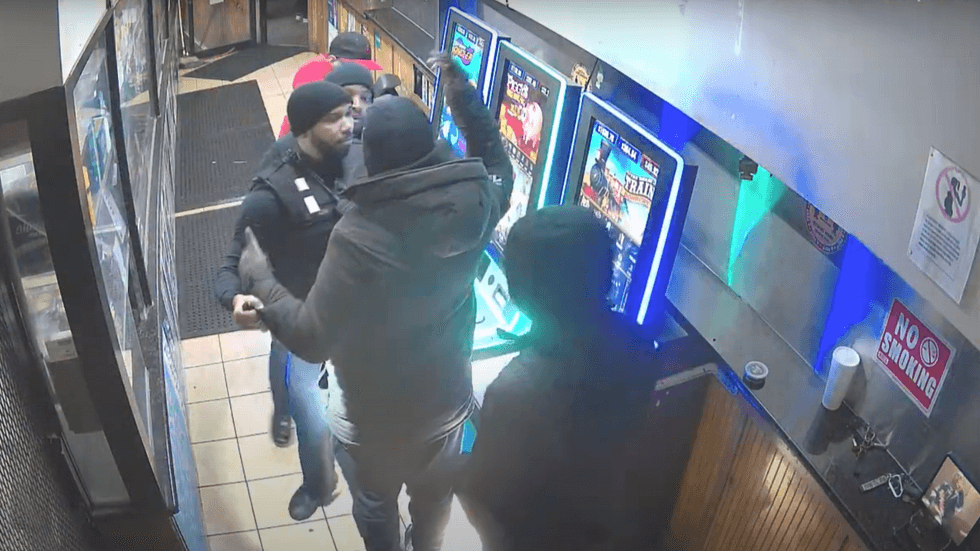 A still from surveillance video, provided by police, shows a struggle ensue between officers and Alexander Spencer on Jan. 26, 2024.