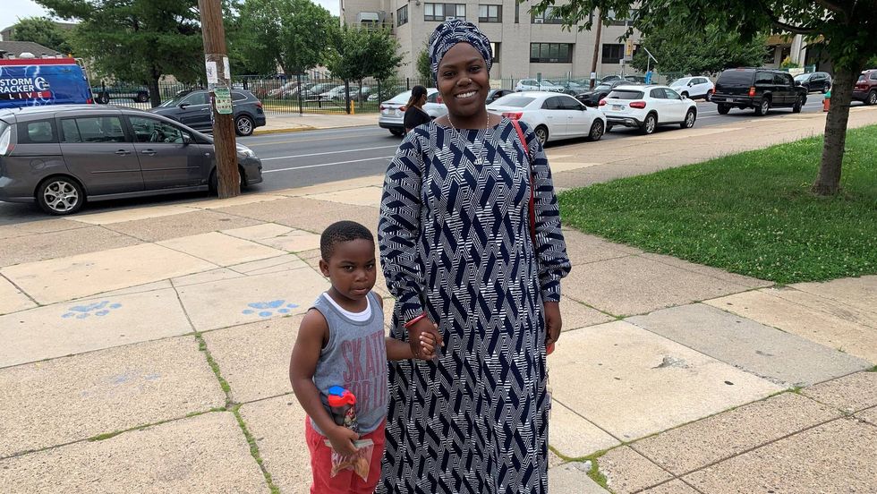 A student and parent attending a School District of Philadelphia summer enrichment program class.