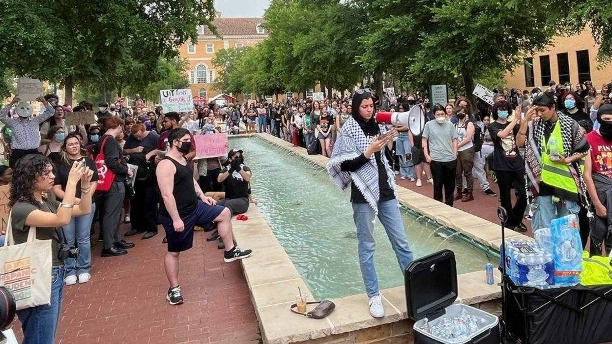 A student leads a protest on the University of North Texas campus in Denton, Texas, on Tuesday, April 30, 2024.