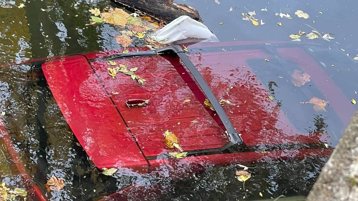 A submerged vehicle in Kennett Square. A police officer rescued the driver.