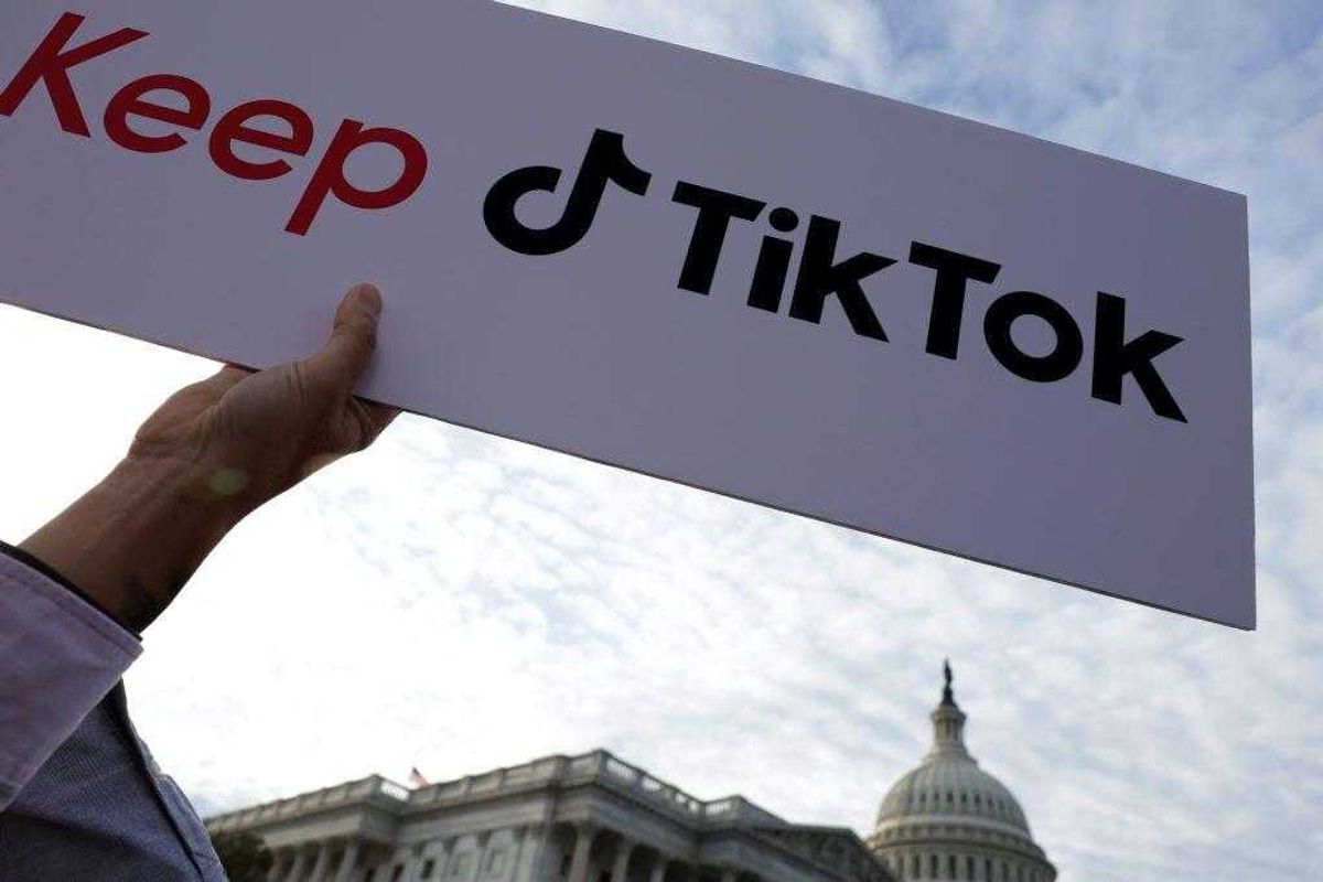 A supporter holds up a sign that read "Keep TikTok" during a news conference on TikTok in front of the U.S. Capitol on March 22, 2023 in Washington, DC.