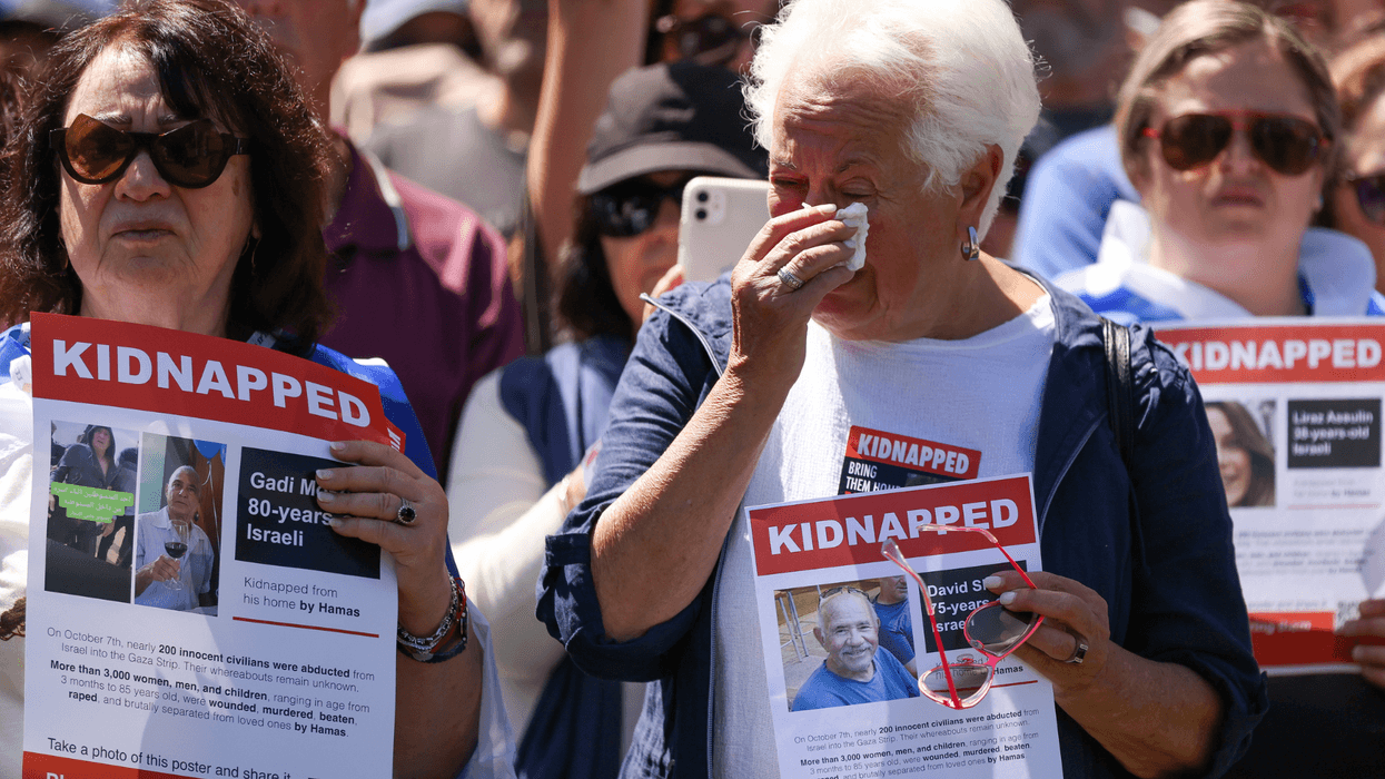 A supporter of Israel reacts at a rally in solidarity for the victims and hostages following the recent attacks on October 29, 2023 in Melbourne, Australia. On October 7, the Palestinian militant group Hamas launched the largest surprise attack from Gaza in a generation, sending thousands of missiles and an unknown number of fighters by land, who shot and kidnapped Israelis in communities near the Gaza border. The attack prompted retaliatory strikes on Gaza and a declaration of war by the Israeli prime minister.
