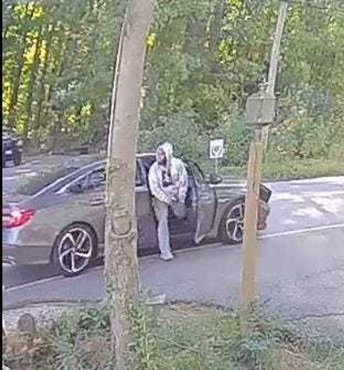 A suspect connected to a package scam incident in New Hampshire.