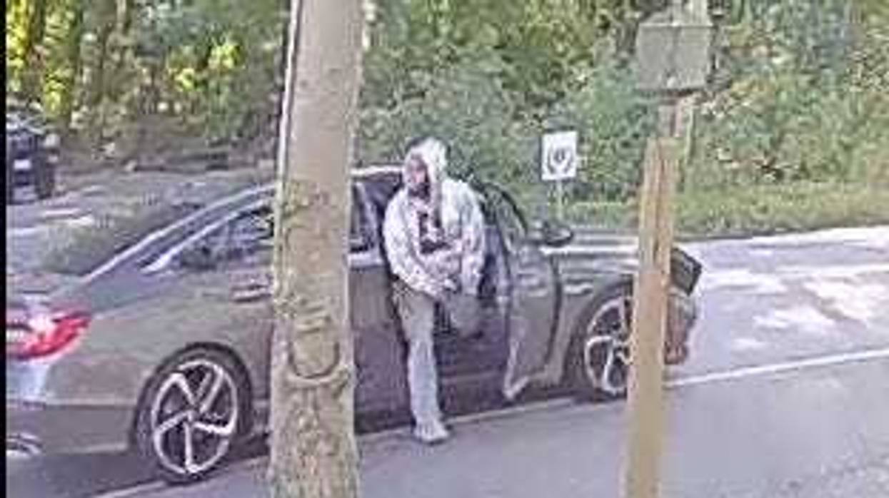 A suspect connected to a package scam incident in New Hampshire.